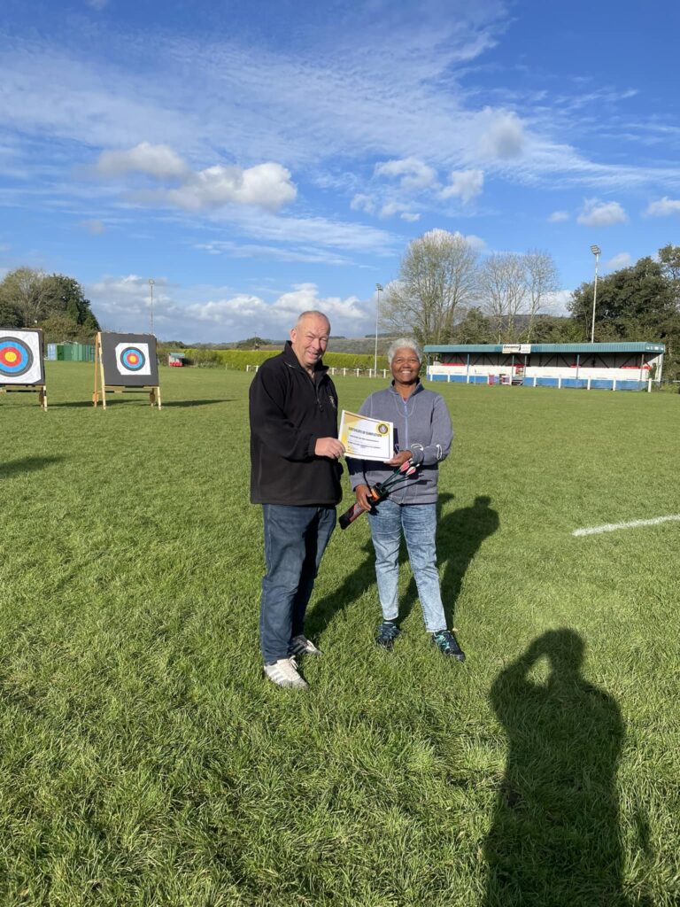 a beginner being presented with a certificate