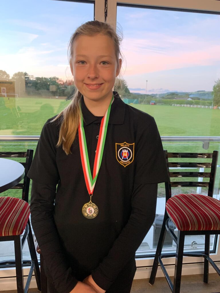 a member of neath archers with a gold medal 