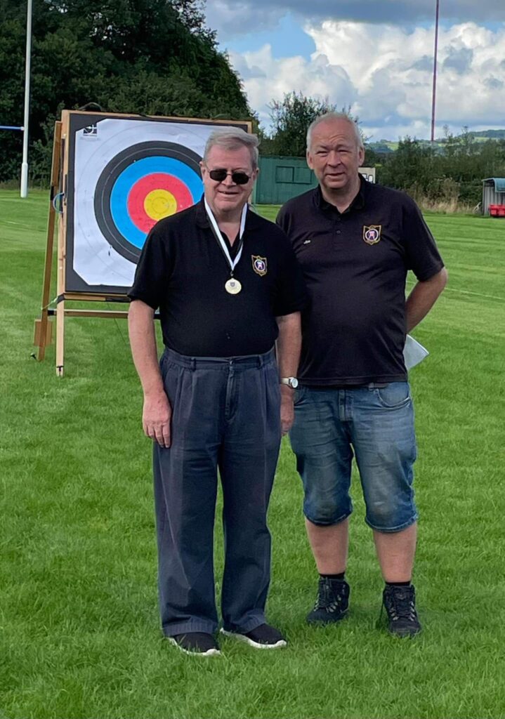 a Neath Archers' member recieving a medal 