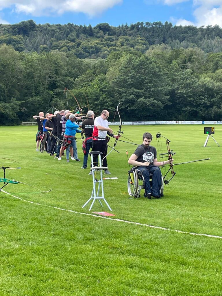 group of Neath Archers' members shooting